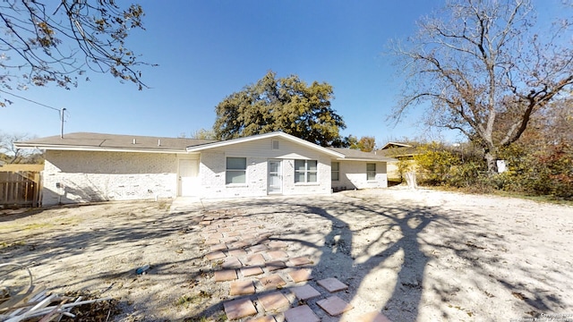 back of property featuring a patio