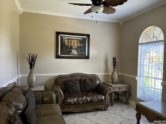 tiled living room with a textured ceiling, crown molding, and ceiling fan