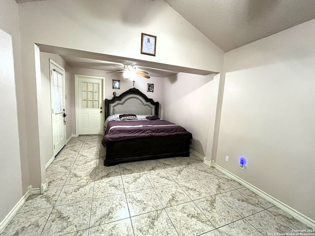 bedroom featuring lofted ceiling, light tile floors, and ceiling fan