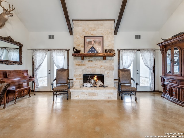 living room with french doors, lofted ceiling with beams, a fireplace, and a wealth of natural light