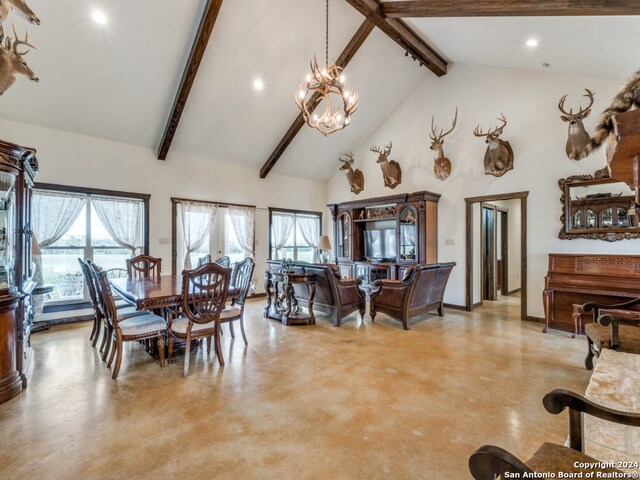 dining space with a notable chandelier, high vaulted ceiling, and beam ceiling