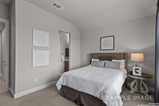 carpeted bedroom with lofted ceiling