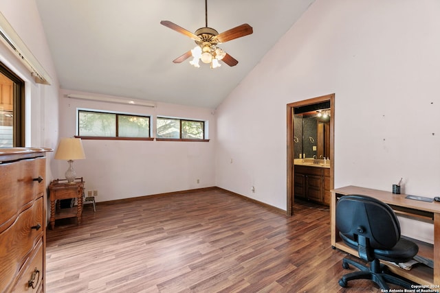 office featuring ceiling fan, wood-type flooring, and high vaulted ceiling