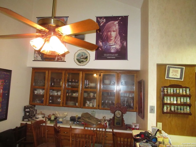 interior space with ceiling fan