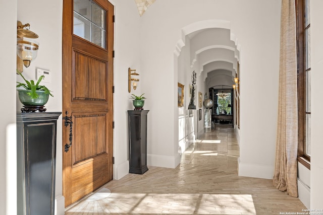 foyer entrance with light wood-type flooring