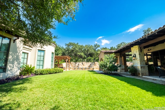 view of yard with a pergola