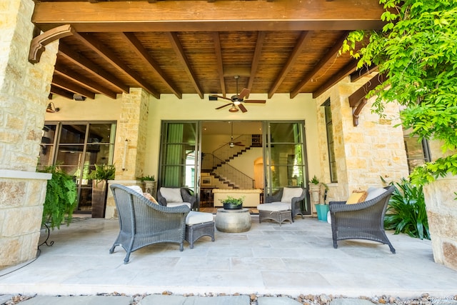 view of patio featuring ceiling fan and an outdoor living space