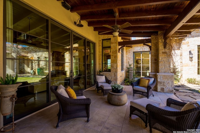 view of patio / terrace with ceiling fan and an outdoor hangout area