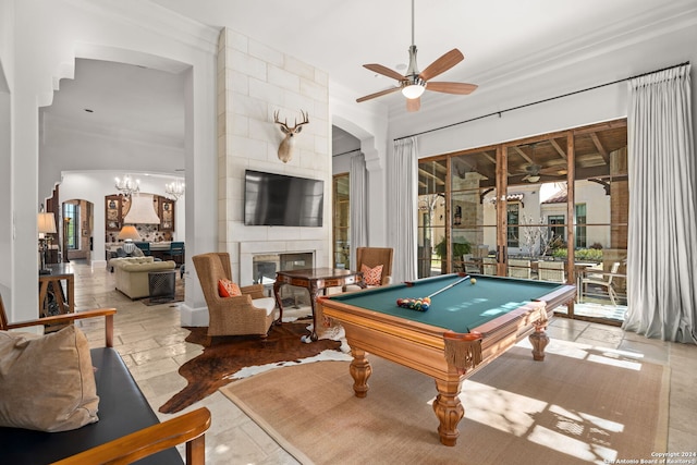 game room with light tile patterned flooring, a tile fireplace, pool table, and ceiling fan