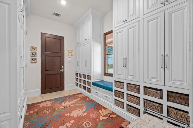 mudroom featuring light tile patterned floors