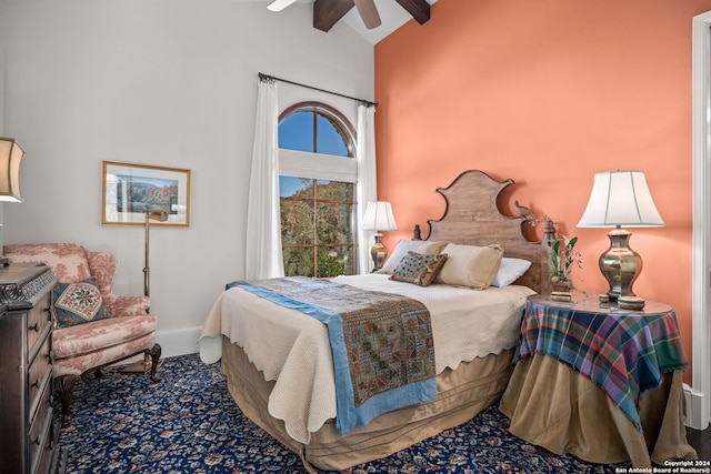 bedroom featuring ceiling fan and carpet