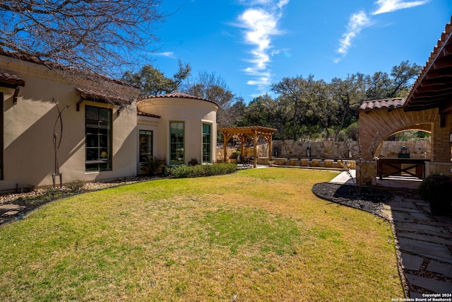 view of yard featuring a pergola and a patio area