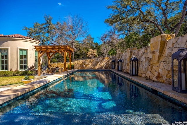 view of pool featuring a pergola