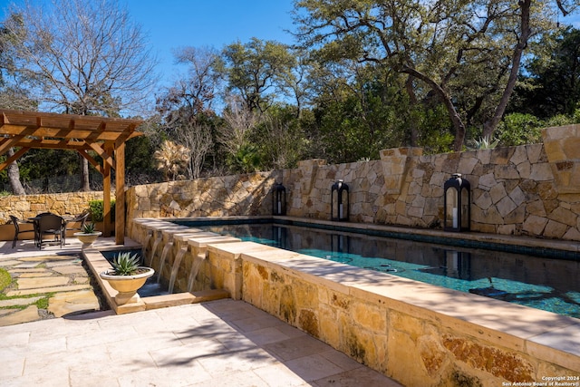 view of pool featuring a pergola and a patio