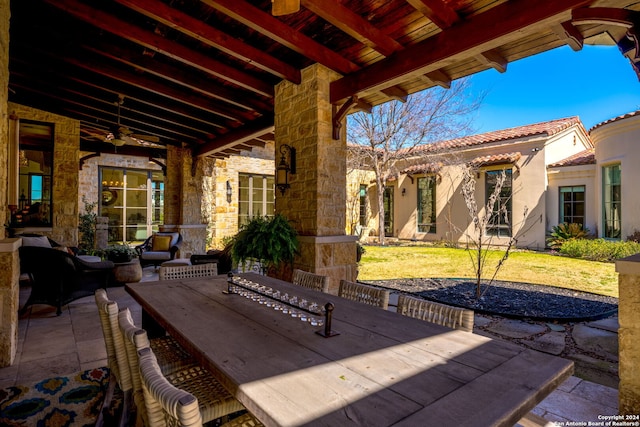 view of patio with ceiling fan