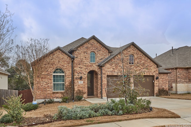 view of front of property with a garage