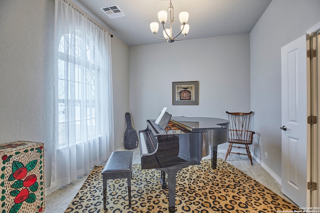 interior space featuring a notable chandelier and plenty of natural light