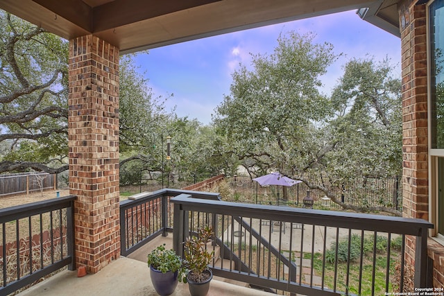 wooden balcony featuring a deck