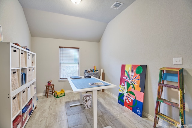 game room featuring lofted ceiling