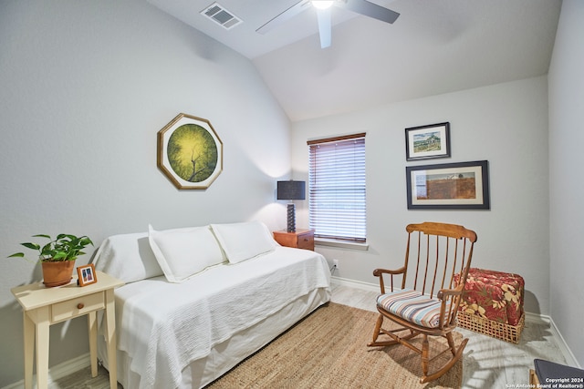 bedroom featuring ceiling fan and lofted ceiling