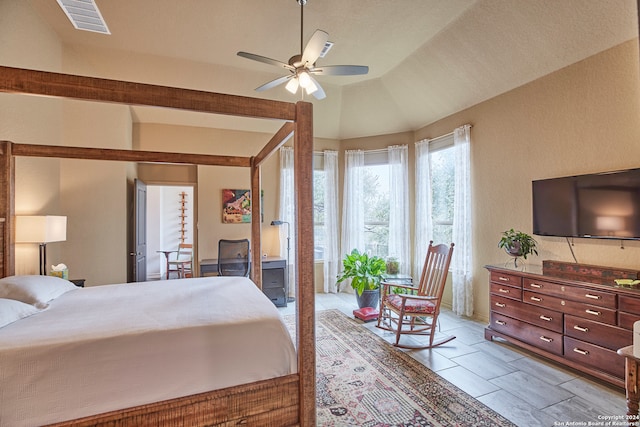 bedroom with ceiling fan and vaulted ceiling