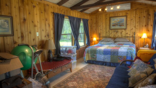 bedroom with a wall mounted AC, wood walls, light colored carpet, and lofted ceiling with beams