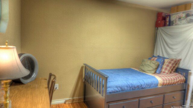 bedroom featuring light hardwood / wood-style floors