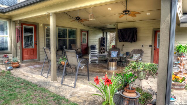 view of patio / terrace featuring ceiling fan