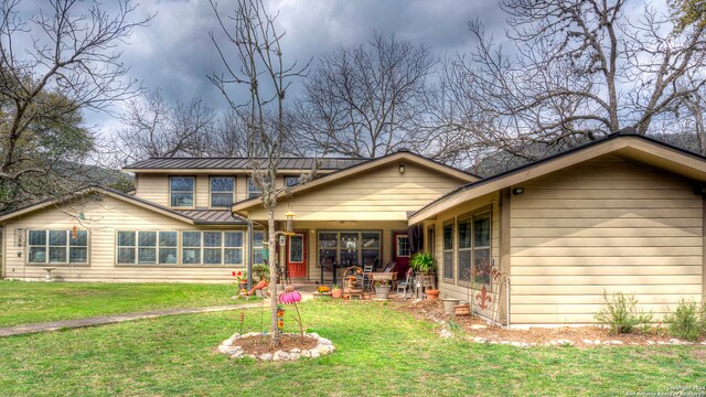 view of front of home with a front lawn