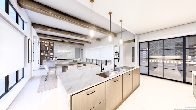 kitchen featuring pendant lighting, light stone counters, beamed ceiling, a wealth of natural light, and light brown cabinets