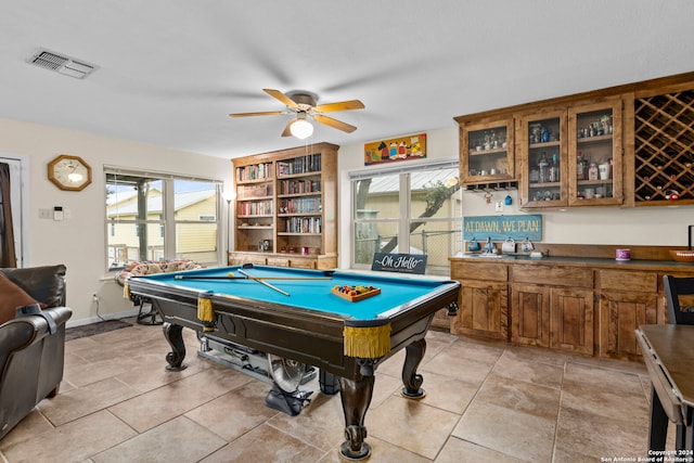 rec room featuring billiards, ceiling fan, and plenty of natural light