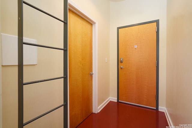 hallway featuring wood-type flooring