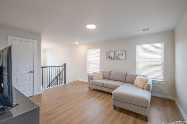 living room with light wood-type flooring