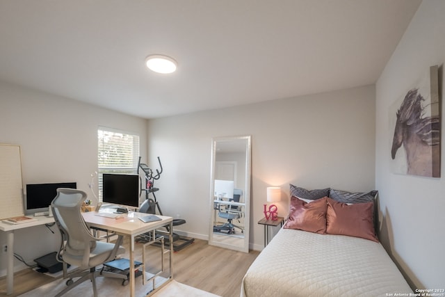 bedroom featuring light hardwood / wood-style floors