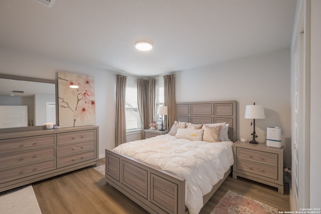 bedroom featuring light hardwood / wood-style flooring