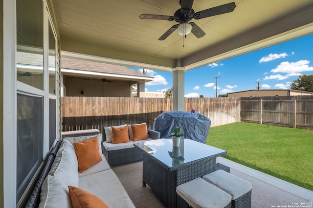 view of terrace featuring area for grilling, outdoor lounge area, and ceiling fan