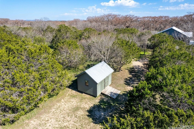 794 Rio Luna Dr, Bandera, TX 78003 - birds eye view of property featuring a view of trees
