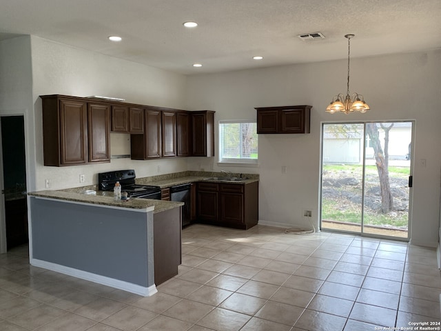 kitchen with a chandelier, light tile flooring, electric range, and stainless steel dishwasher