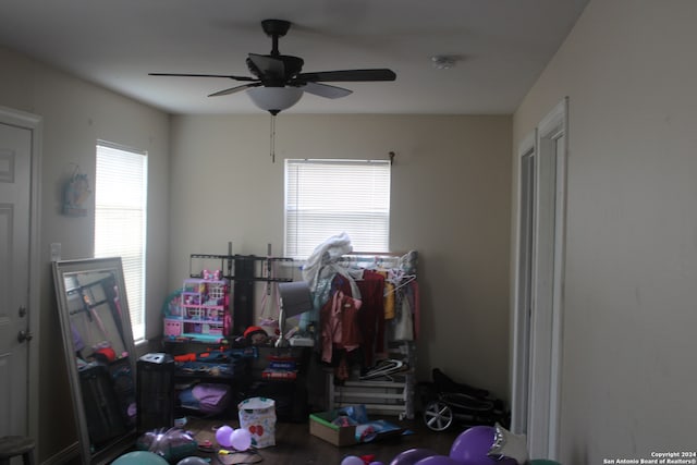 miscellaneous room featuring ceiling fan