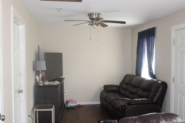 interior space featuring wood-type flooring and ceiling fan