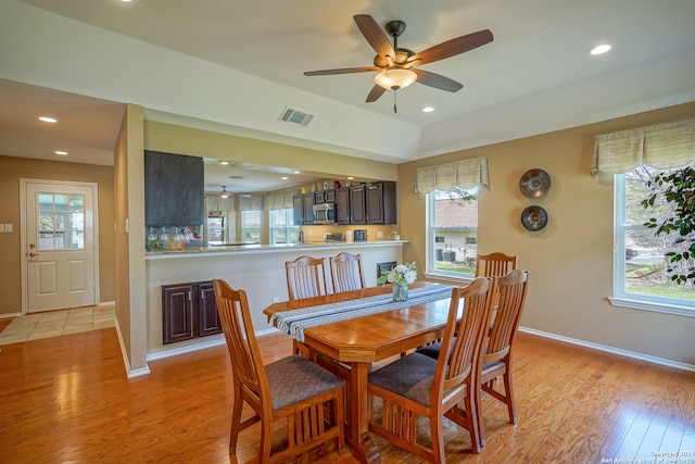 dining room featuring light wood-type flooring and ceiling fan