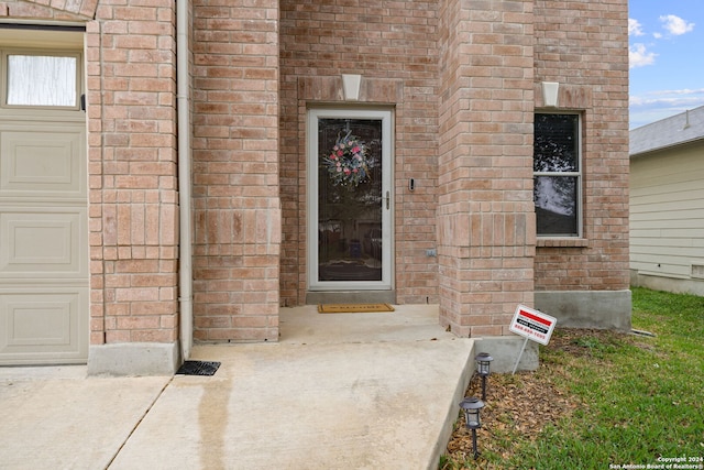 property entrance featuring a garage