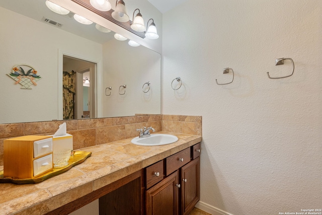 bathroom featuring vanity