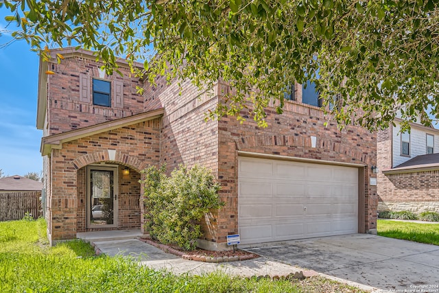 view of front of property featuring a garage