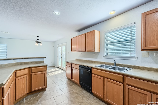 kitchen featuring light tile flooring, a textured ceiling, sink, black dishwasher, and french doors