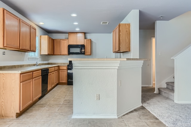 kitchen with sink, light colored carpet, black appliances, and kitchen peninsula