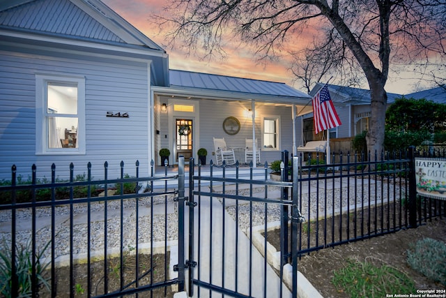 view of front of house with covered porch