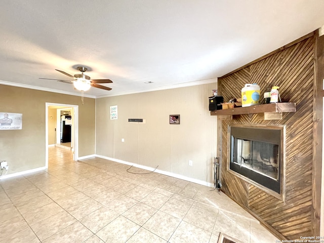 unfurnished living room with a large fireplace, ornamental molding, light tile flooring, and ceiling fan