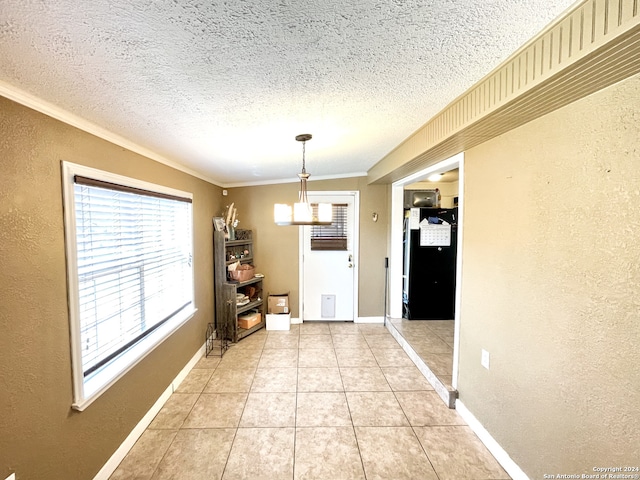 interior space featuring crown molding, an inviting chandelier, and a textured ceiling