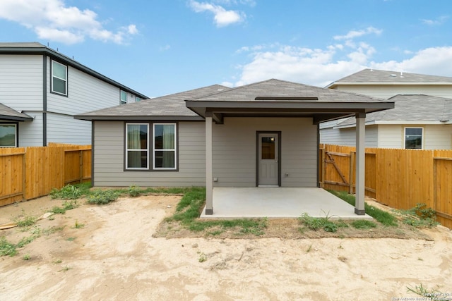 rear view of property with a patio area